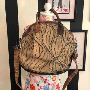 Beautiful shoulder bag with studs and rhinestones